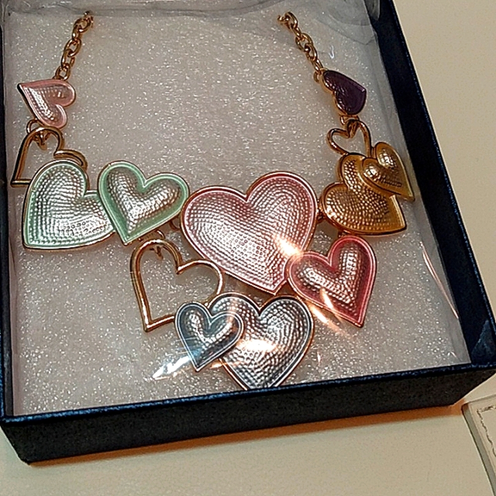 Gold tone heart enamel necklace